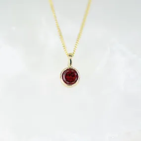 Gold 5mm Garnet Andromeda Pendant